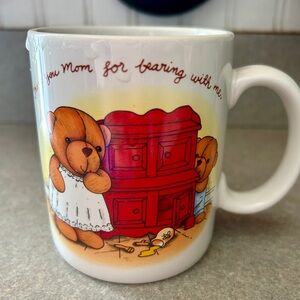 Avon White Ceramic Teddy Bear Mug with Red Dresser Illustration